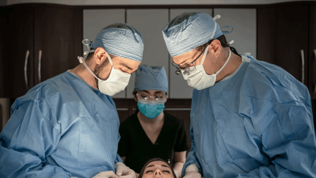 Maxillofacial surgeon extracting wisdom teeth in an oral surgery clinic in Montreal. 