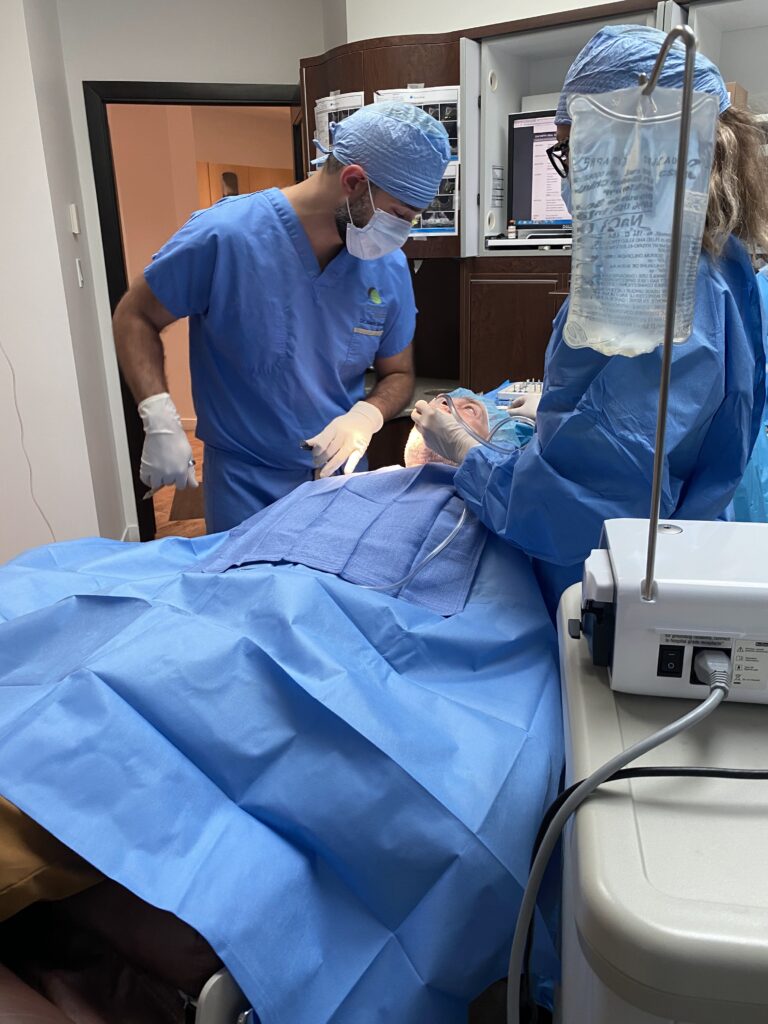 Dental implants Montreal consultation with oral surgeon and patient