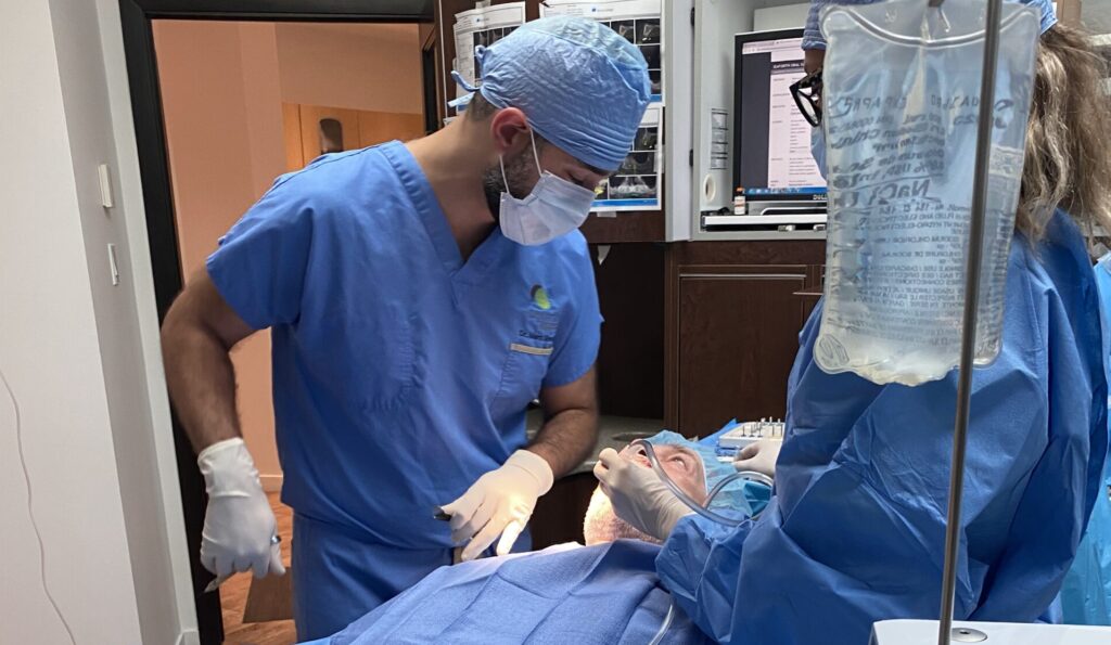 Dental implants Montreal consultation with oral surgeon and patient